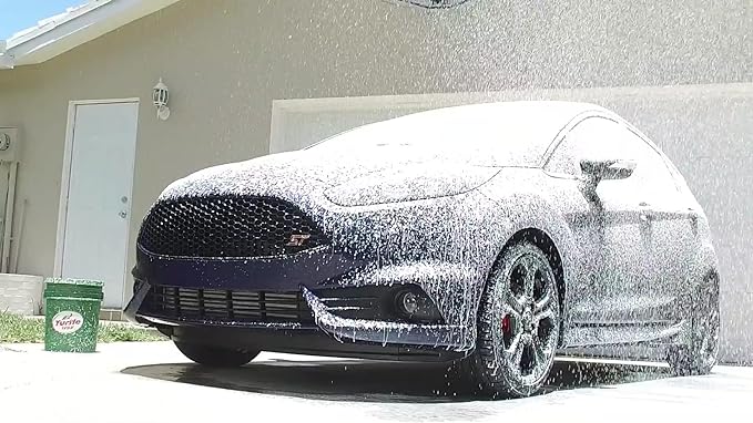 a car covered in snow foam.