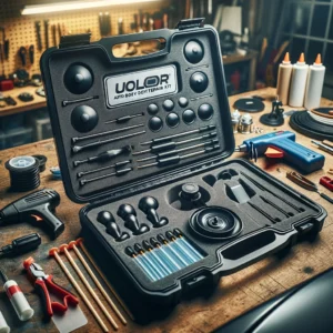 The Uolor Auto Body Dent Repair Kit laid out neatly on a workbench, showcasing its various components such as suction cups, glue sticks, a glue gun, a